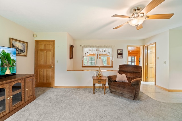 2230 Oleary Rd, Jackson, MI 49201 - sitting room featuring a ceiling fan, carpet, and tile patterned flooring