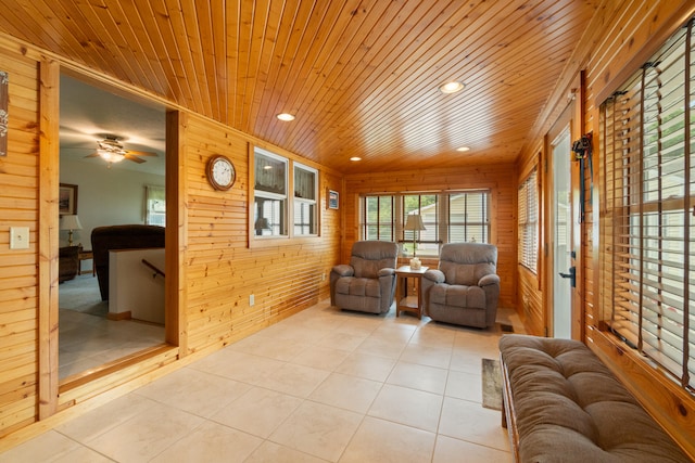 2230 Oleary Rd, Jackson, MI 49201 - living area featuring wooden ceiling, wood walls, light tile patterned floors, ceiling fan, and recessed lighting