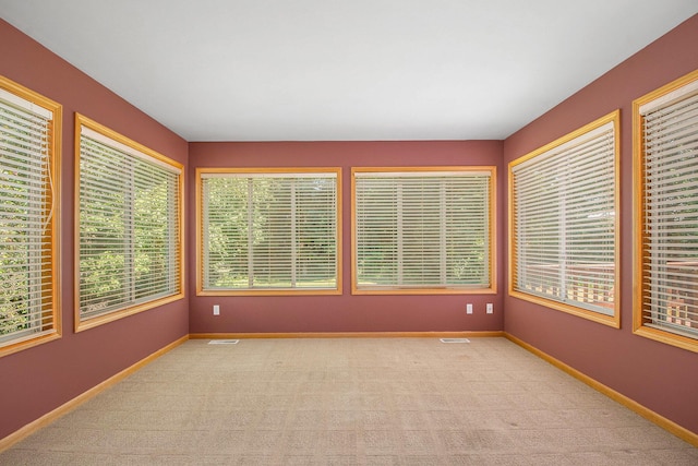 4291 Bramblewood Ct, Dorr, MI 49323 - unfurnished sunroom with carpet floors