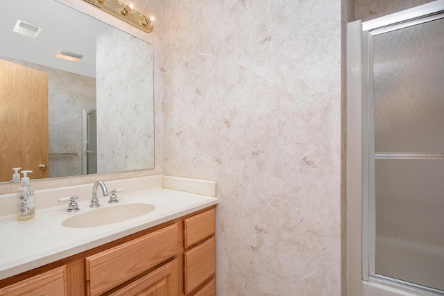 4291 Bramblewood Ct, Dorr, MI 49323 - full bath featuring vanity and a shower with shower door