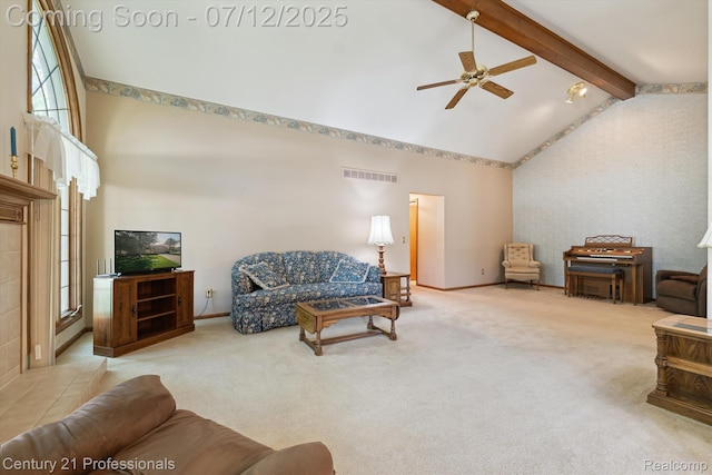 17012 Coral Ln, Macomb, MI 48042 - carpeted living room featuring high vaulted ceiling, a ceiling fan, and beamed ceiling