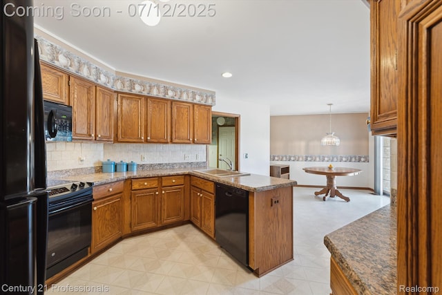 17012 Coral Ln, Macomb, MI 48042 - kitchen with black appliances, brown cabinetry, a peninsula, backsplash, and light flooring