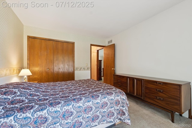 17012 Coral Ln, Macomb, MI 48042 - bedroom featuring wallpapered walls, a closet, and light carpet