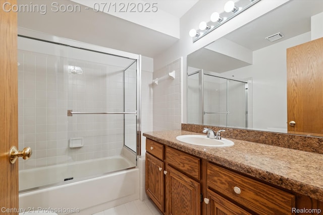 17012 Coral Ln, Macomb, MI 48042 - bathroom featuring vanity, bath / shower combo with glass door, and tile patterned floors