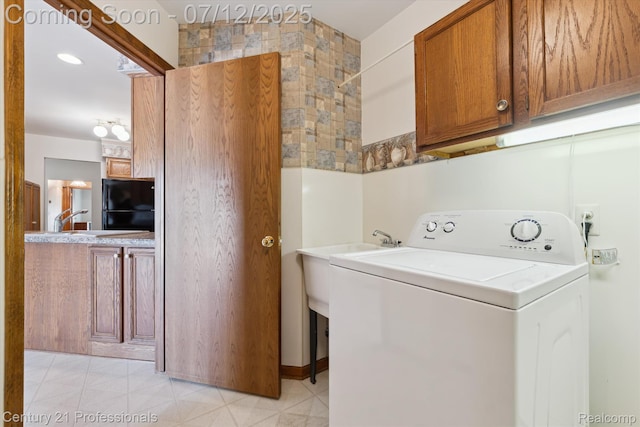 17012 Coral Ln, Macomb, MI 48042 - laundry area featuring washer / clothes dryer and cabinet space