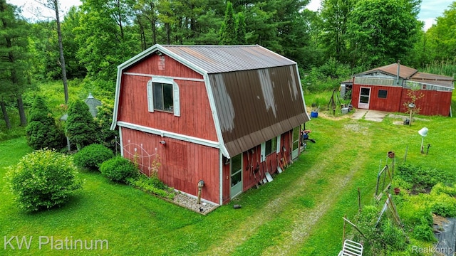 6636 Broadbridge Rd, Cottrellville, MI 48039 - view of barn with a yard