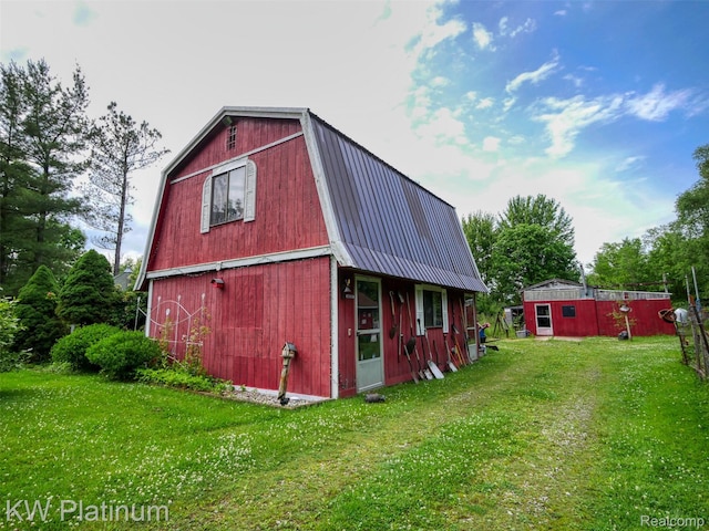 6636 Broadbridge Rd, Cottrellville, MI 48039 - view of barn with a lawn