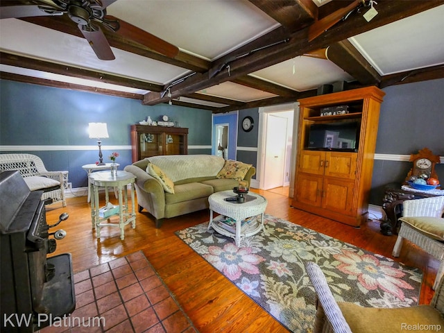 6636 Broadbridge Rd, Cottrellville, MI 48039 - living area featuring beam ceiling, a ceiling fan, and wood finished floors