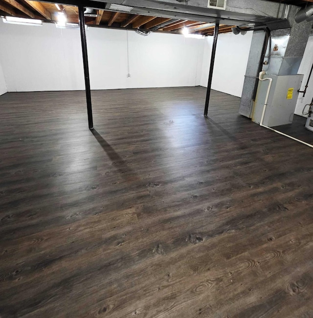 44497 Savery Dr, Canton, MI 48187 - unfinished basement with dark wood-style floors and heating unit
