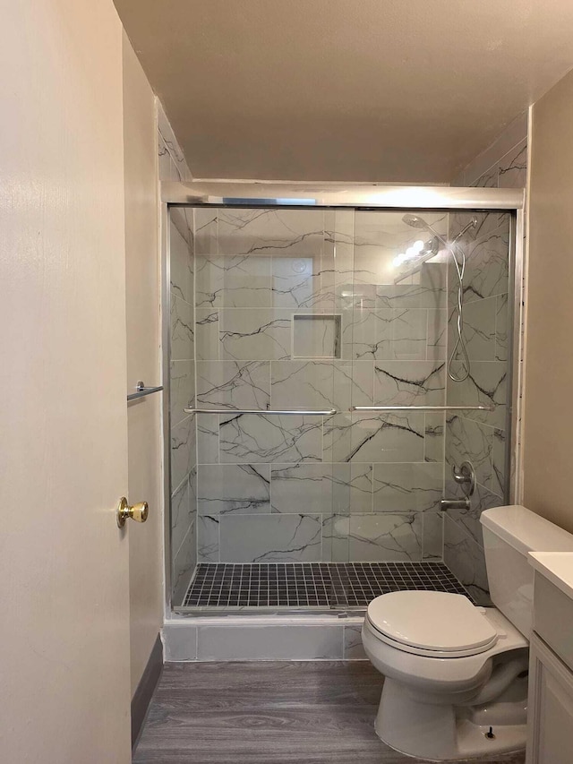 44497 Savery Dr, Canton, MI 48187 - full bath featuring a marble finish shower, wood finished floors, and vanity