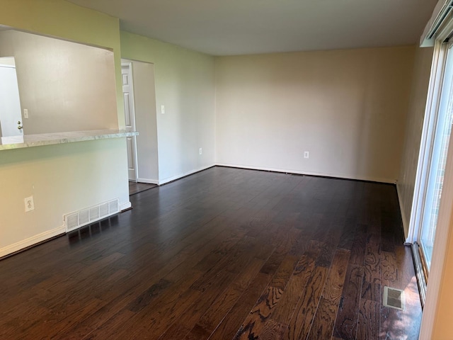 44497 Savery Dr, Canton, MI 48187 - unfurnished room with dark wood-style flooring and healthy amount of natural light