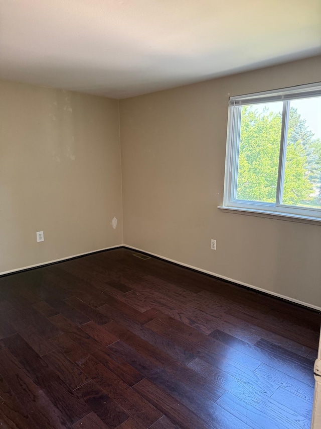 44497 Savery Dr, Canton, MI 48187 - spare room with dark wood finished floors