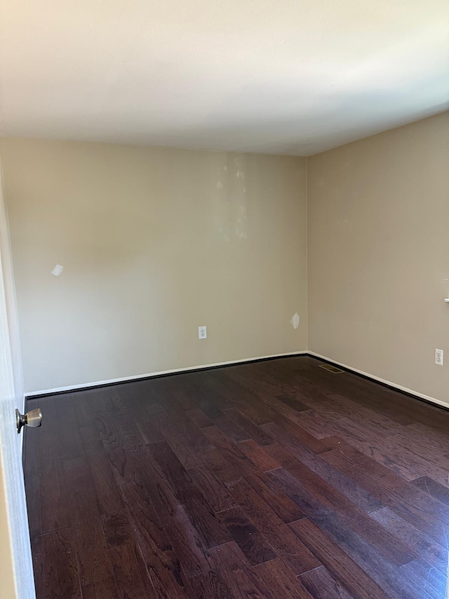 44497 Savery Dr, Canton, MI 48187 - unfurnished room with dark wood finished floors and baseboards
