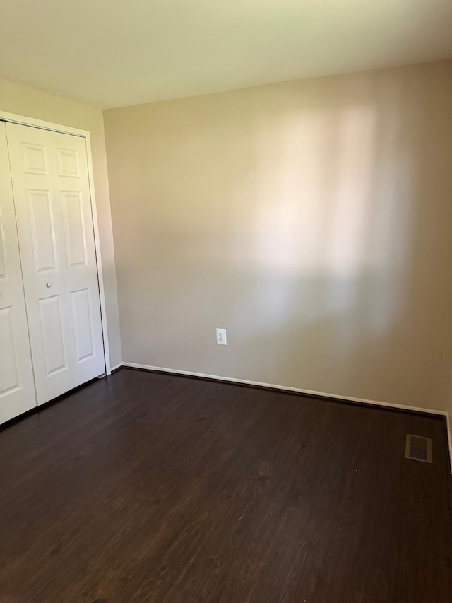 44497 Savery Dr, Canton, MI 48187 - spare room with dark wood-style floors and baseboards