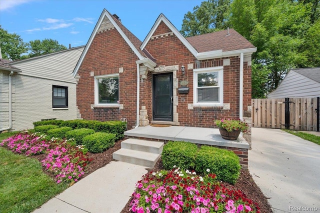 1450 Hampton Rd, Grosse Pointe Woods, MI 48236 - view of front of house featuring brick siding