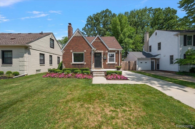 1450 Hampton Rd, Grosse Pointe Woods, MI 48236 - view of front facade with brick siding, concrete driveway, a garage, and a chimney