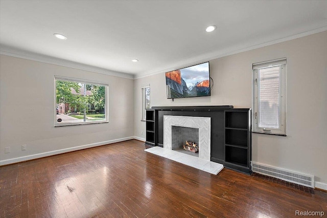 1450 Hampton Rd, Grosse Pointe Woods, MI 48236 - unfurnished living room featuring crown molding, wood finished floors, a premium fireplace, and recessed lighting