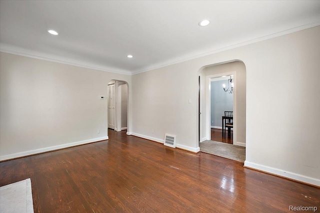 1450 Hampton Rd, Grosse Pointe Woods, MI 48236 - spare room featuring arched walkways, crown molding, wood finished floors, recessed lighting, and a chandelier