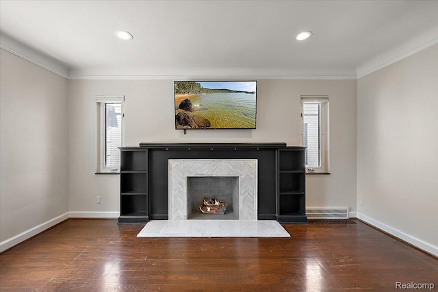 1450 Hampton Rd, Grosse Pointe Woods, MI 48236 - unfurnished living room with ornamental molding, wood finished floors, plenty of natural light, recessed lighting, and a lit fireplace