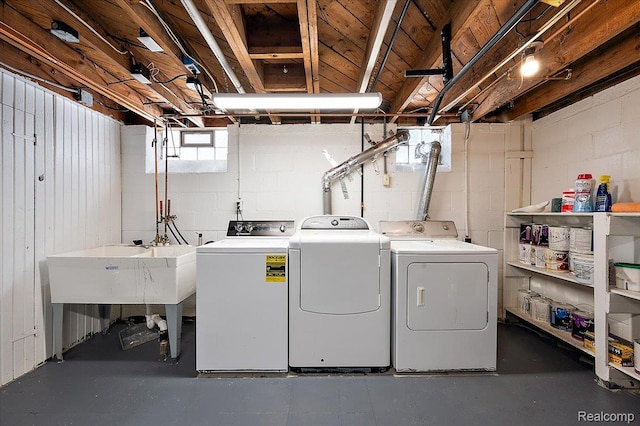 1450 Hampton Rd, Grosse Pointe Woods, MI 48236 - laundry area featuring separate washer and dryer and concrete block wall