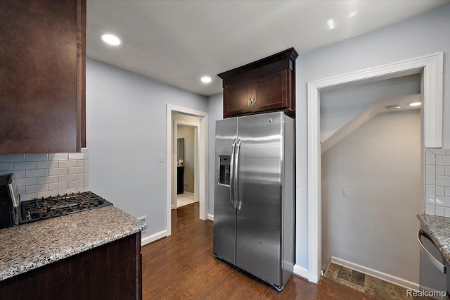 1450 Hampton Rd, Grosse Pointe Woods, MI 48236 - kitchen with appliances with stainless steel finishes, dark brown cabinets, tasteful backsplash, recessed lighting, and light stone counters