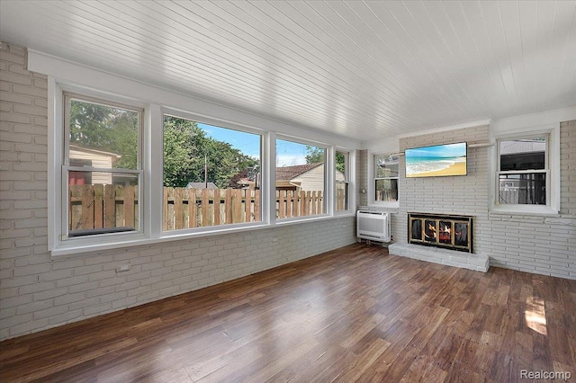 1450 Hampton Rd, Grosse Pointe Woods, MI 48236 - unfurnished sunroom with healthy amount of natural light and a wall unit AC