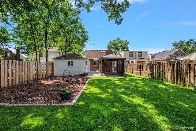 1450 Hampton Rd, Grosse Pointe Woods, MI 48236 - rear view of property with a gazebo, a fenced backyard, and an outdoor structure
