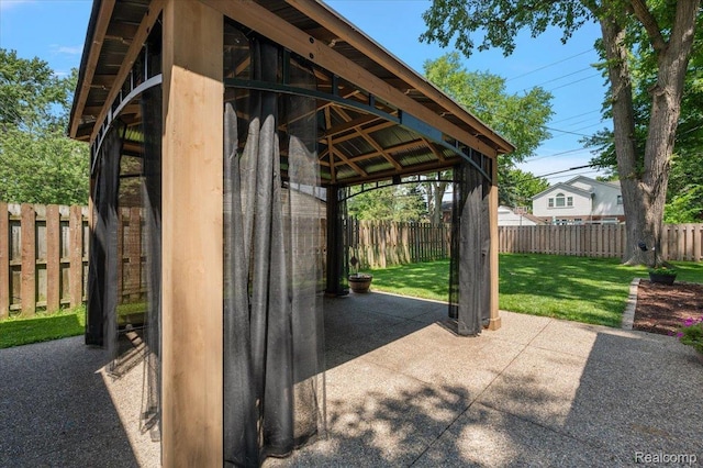 1450 Hampton Rd, Grosse Pointe Woods, MI 48236 - fenced backyard with a gazebo and a patio area