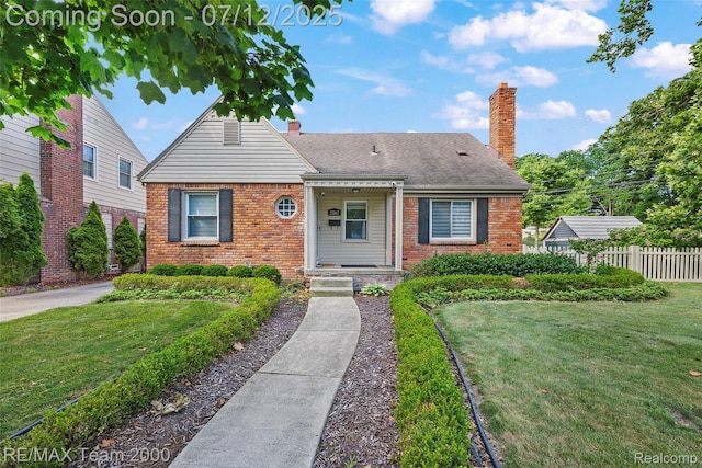 23167 Cromwell St, Canton, MI 48128 - bungalow-style house featuring brick siding and a chimney