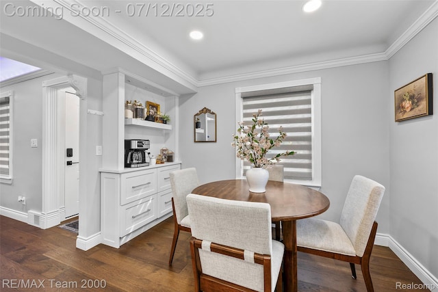 23167 Cromwell St, Canton, MI 48128 - dining space with dark wood-type flooring, ornamental molding, and recessed lighting