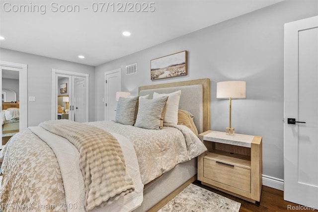 23167 Cromwell St, Canton, MI 48128 - bedroom with recessed lighting, dark wood-style floors, and a closet