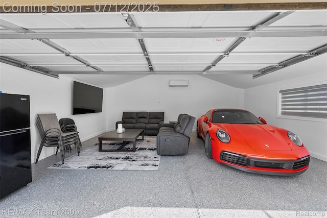 23167 Cromwell St, Canton, MI 48128 - garage featuring freestanding refrigerator and baseboards