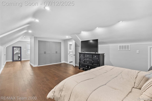 23167 Cromwell St, Canton, MI 48128 - bedroom featuring wood-type flooring, vaulted ceiling, and recessed lighting