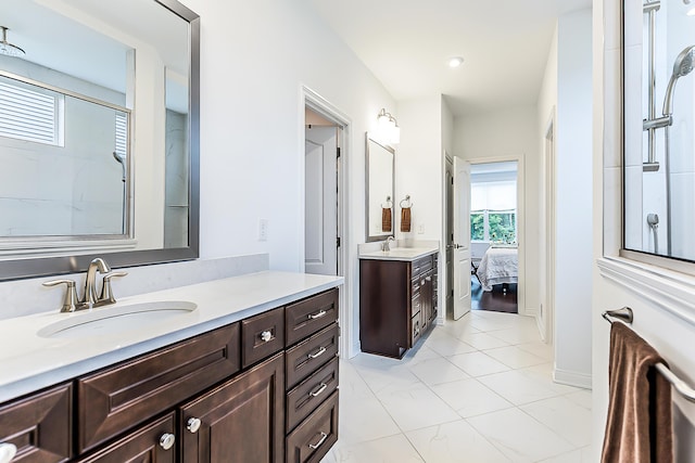 2448 Meadow Hills Dr, Ann Arbor, MI 48108 - ensuite bathroom with vanity, a shower, and tile patterned floors