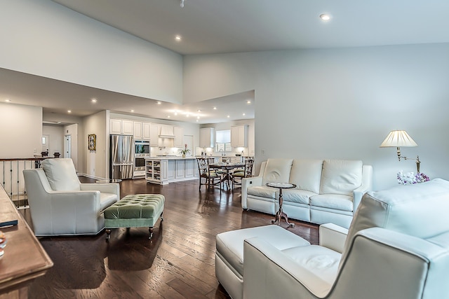 2448 Meadow Hills Dr, Ann Arbor, MI 48108 - living area with dark wood-style floors, recessed lighting, and high vaulted ceiling