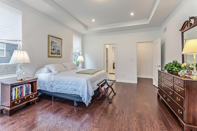 2448 Meadow Hills Dr, Ann Arbor, MI 48108 - bedroom featuring wood finished floors, a raised ceiling, recessed lighting, and ensuite bath