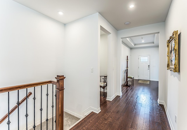 2448 Meadow Hills Dr, Ann Arbor, MI 48108 - corridor with an upstairs landing, hardwood / wood-style floors, recessed lighting, and a tray ceiling