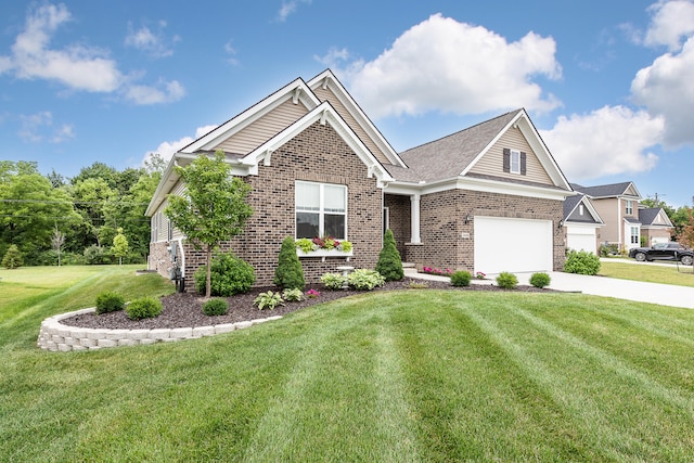 2448 Meadow Hills Dr, Ann Arbor, MI 48108 - view of front of property with brick siding, driveway, a front lawn, and a garage