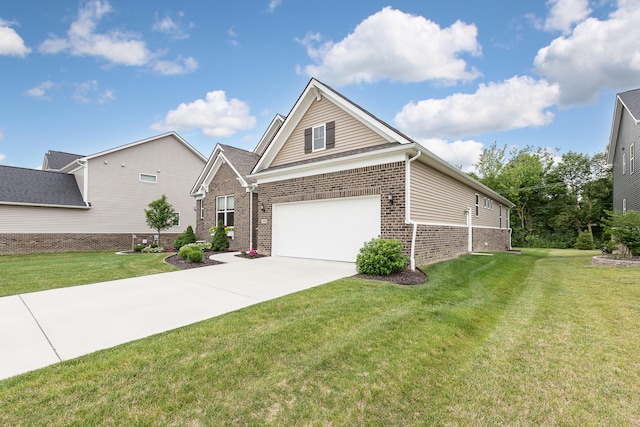 2448 Meadow Hills Dr, Ann Arbor, MI 48108 - view of front of property with brick siding, a garage, a front lawn, and driveway
