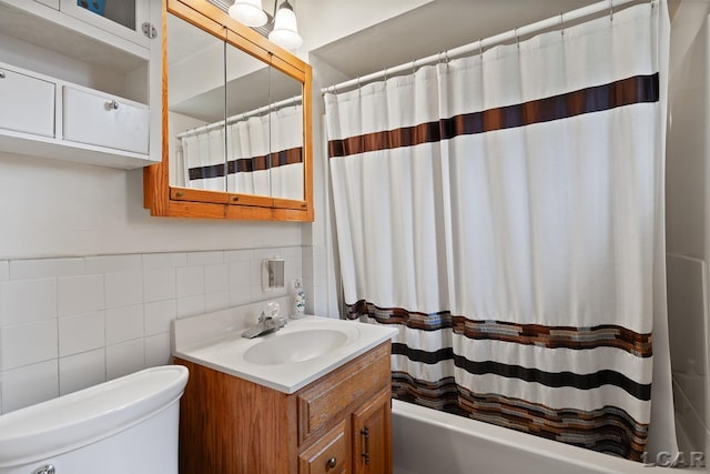 753 Vaniman Island Dr, Brooklyn, MI 49230 - bathroom with vanity, tile walls, and shower / bath combo with shower curtain