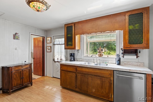 753 Vaniman Island Dr, Brooklyn, MI 49230 - kitchen with dishwasher, light wood-type flooring, light countertops, brown cabinets, and glass insert cabinets