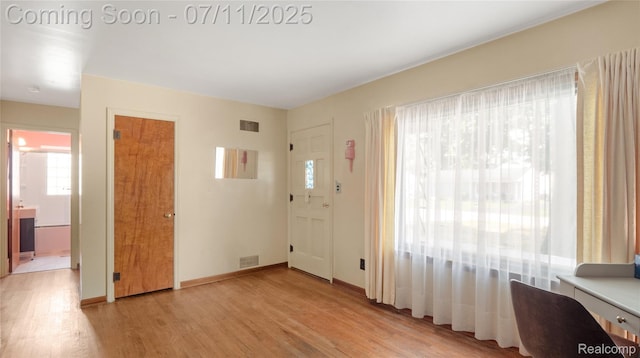 1845 Van Courtland Dr, Troy, MI 48083 - foyer with light wood-style floors and baseboards