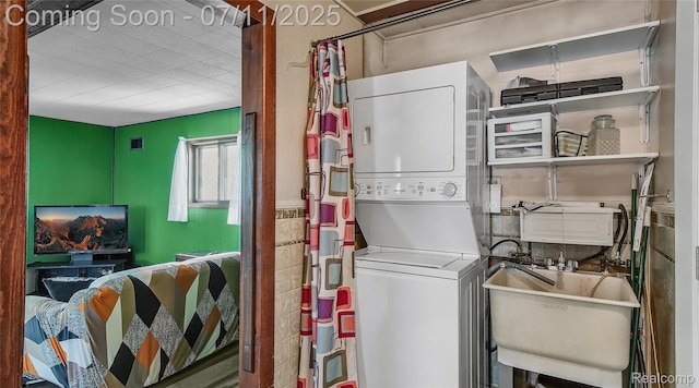 1845 Van Courtland Dr, Troy, MI 48083 - laundry room with stacked washer / dryer