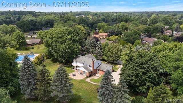 2403 Red Maple Ct, Troy, MI 48098 - view of subject property featuring a heavily wooded area