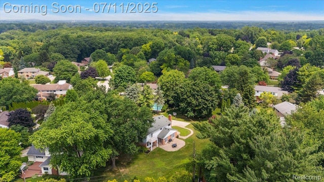 2403 Red Maple Ct, Troy, MI 48098 - aerial view of residential area featuring a heavily wooded area