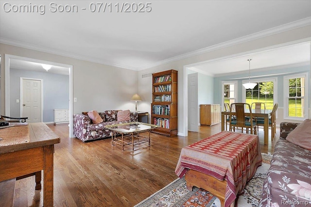 2403 Red Maple Ct, Troy, MI 48098 - living room featuring wood finished floors and ornamental molding