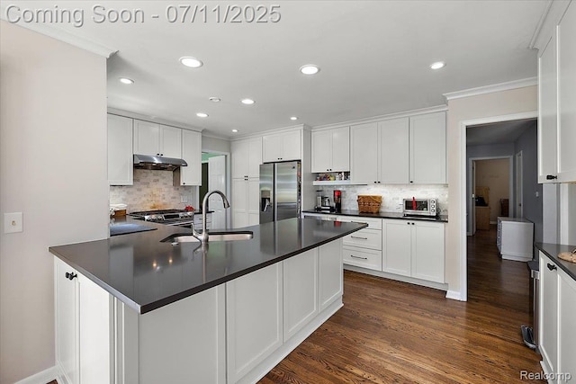2403 Red Maple Ct, Troy, MI 48098 - kitchen with appliances with stainless steel finishes, dark countertops, under cabinet range hood, decorative backsplash, and ornamental molding