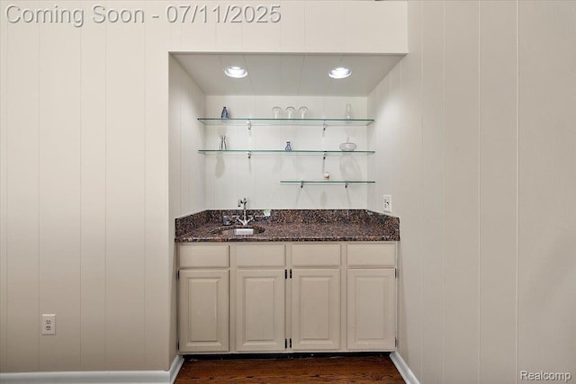 2403 Red Maple Ct, Troy, MI 48098 - indoor wet bar with dark wood finished floors and baseboards