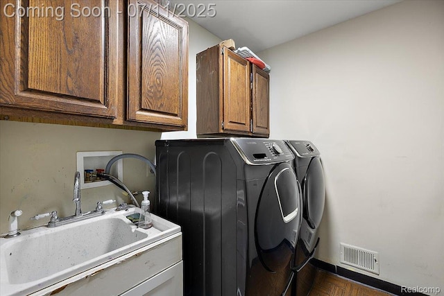 2403 Red Maple Ct, Troy, MI 48098 - laundry room featuring separate washer and dryer and cabinet space