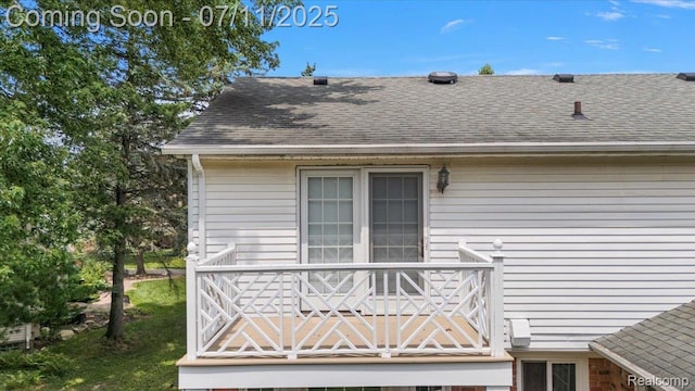 2403 Red Maple Ct, Troy, MI 48098 - exterior view of roof with shingles and a downspout